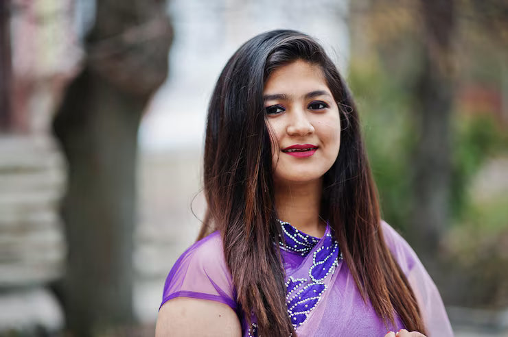 files/close-up-portrait-indian-hindu-girl-traditional-violet-saree-posed-street_627829-12971.avif